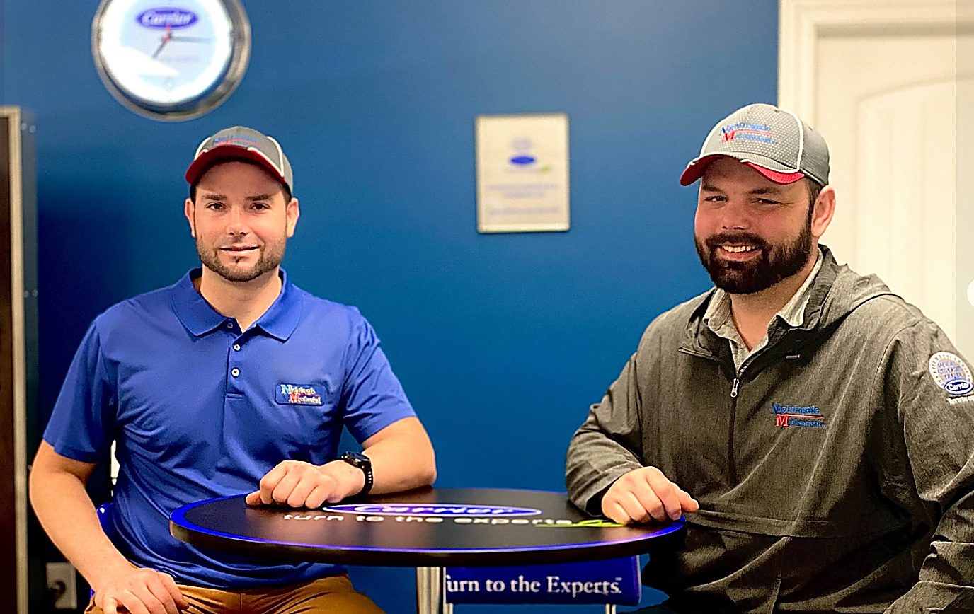 Samuel and Marcus Nightingale at the office