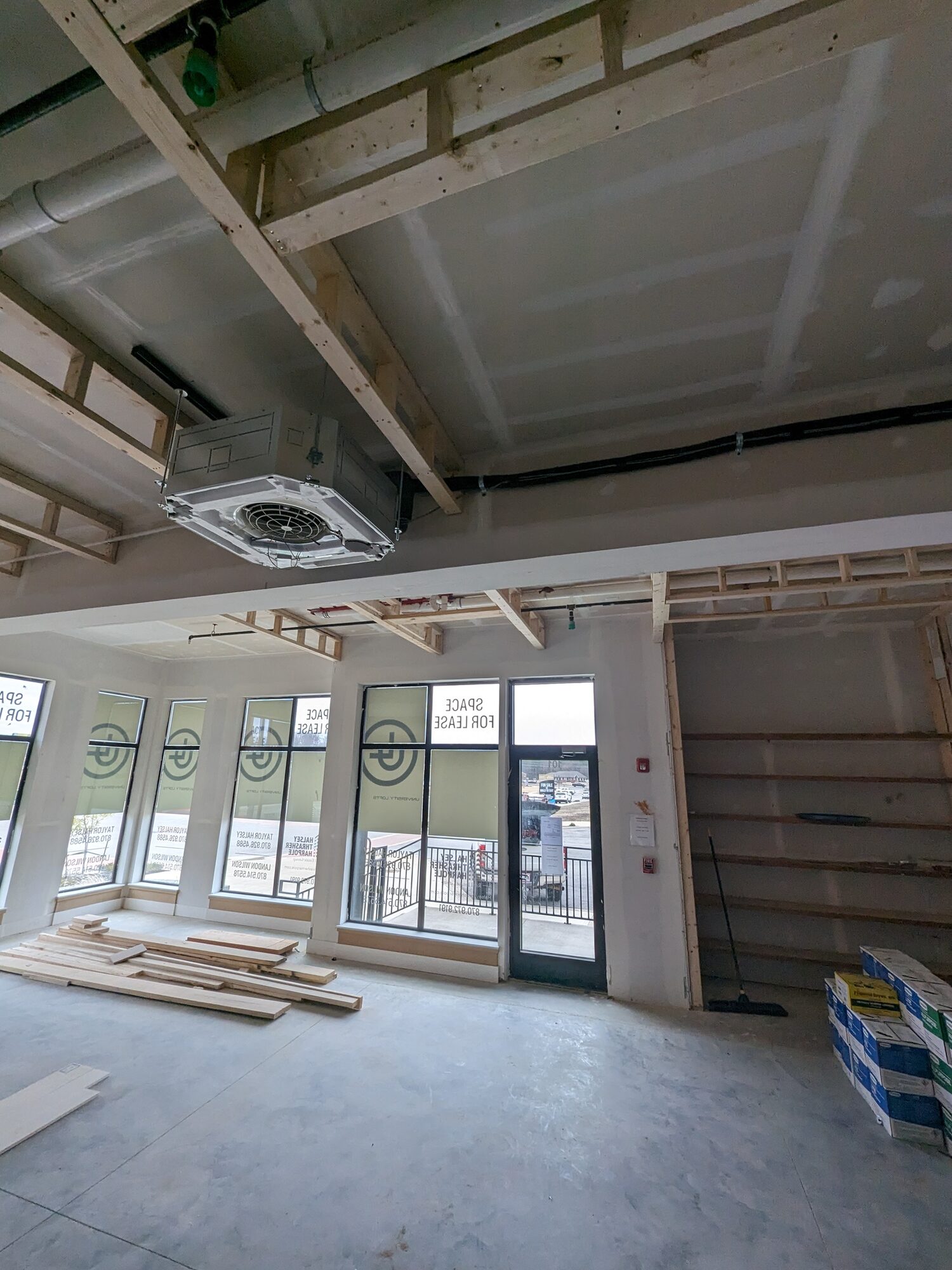 Toshiba-Carrier ceiling cassette VRF indoor unit installed during a commercial office build-out